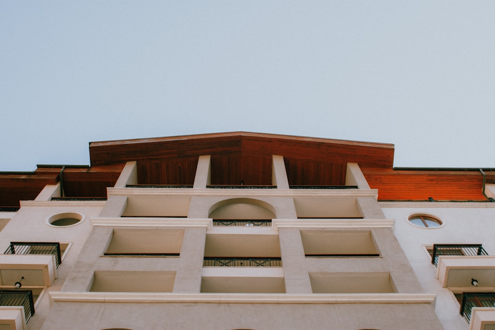 a tall building with a clock on the side of it