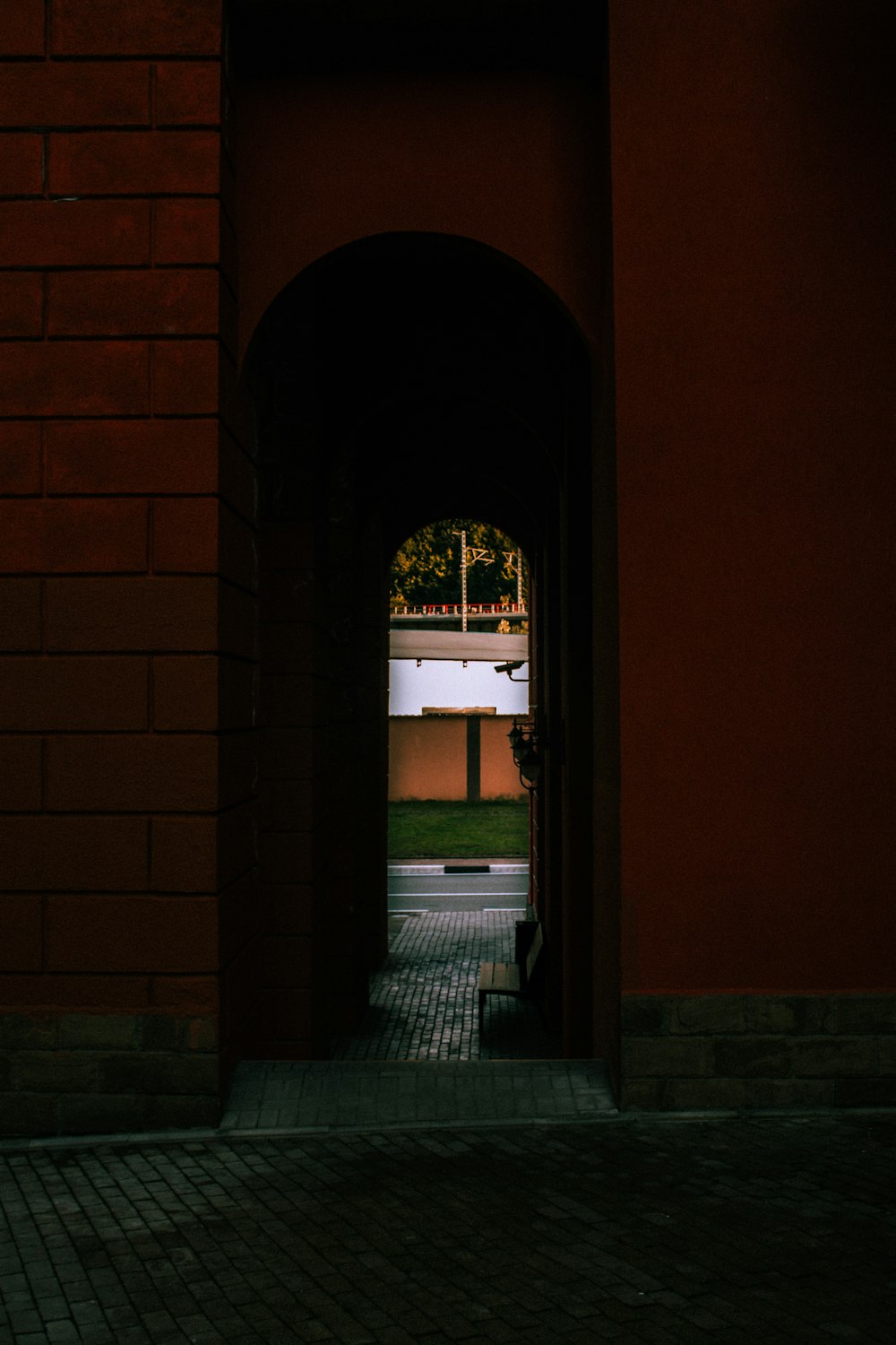 a red brick building with an open doorway