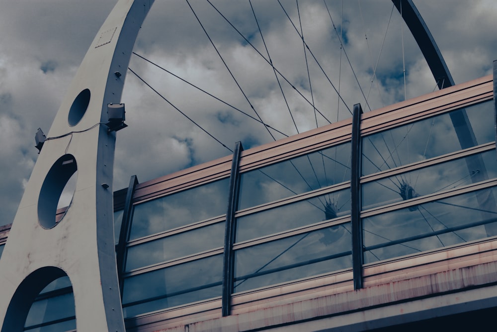 a bridge with a sky background and clouds