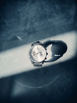 Product photography showcasing a stylish watch with sharp focus and soft shadows.