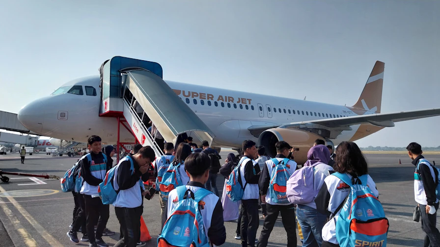 Students engaged in a hands-on aviation training session at Airline Academy India.