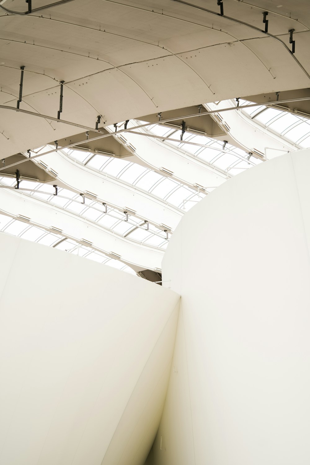 a large white building with a skylight above it