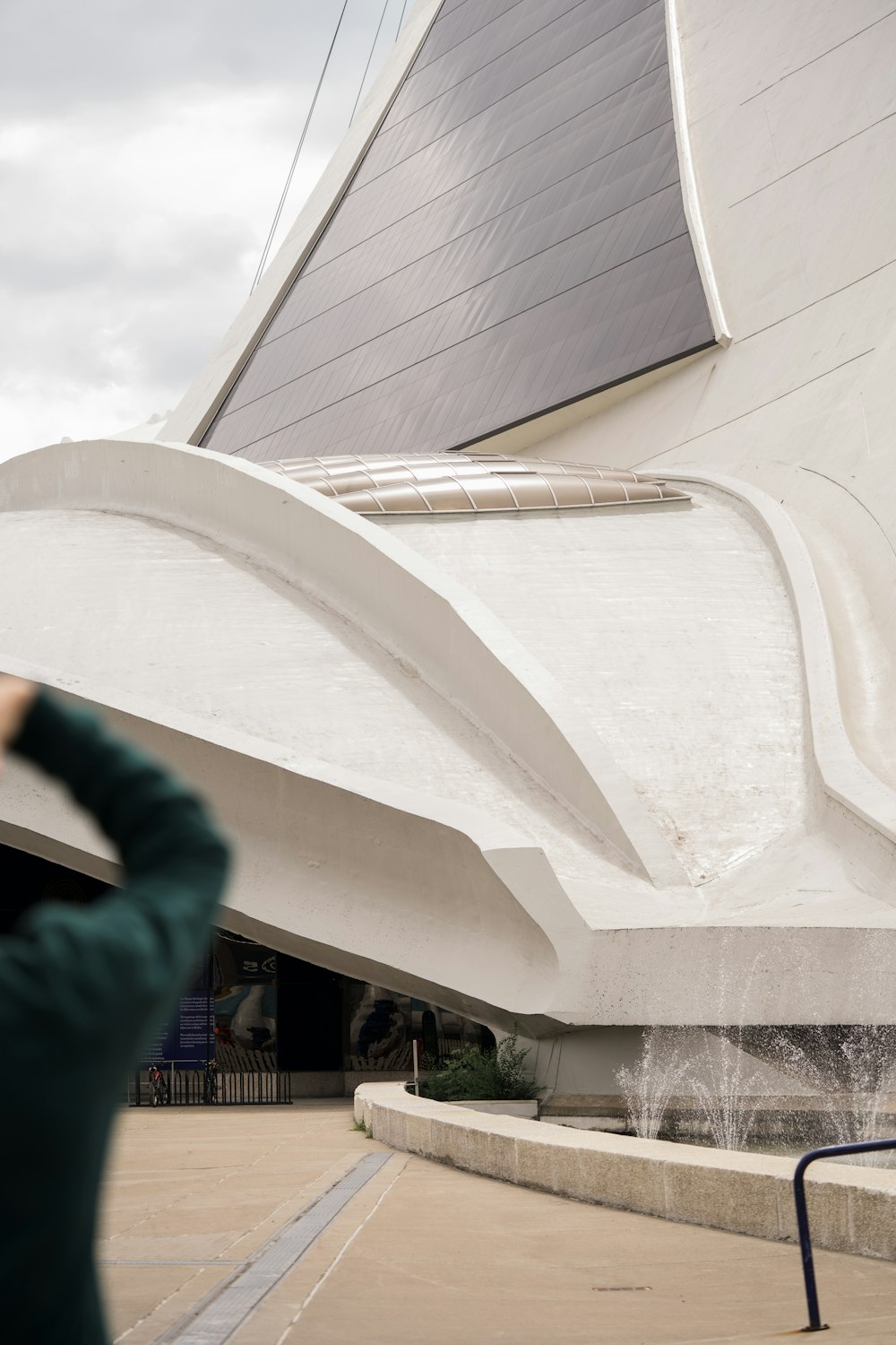 a person taking a picture of a building