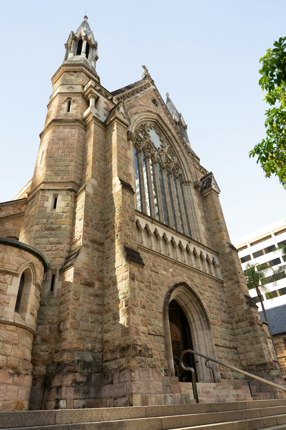 a tall brick building with a clock tower