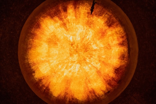 a close up of a yellow object on a table