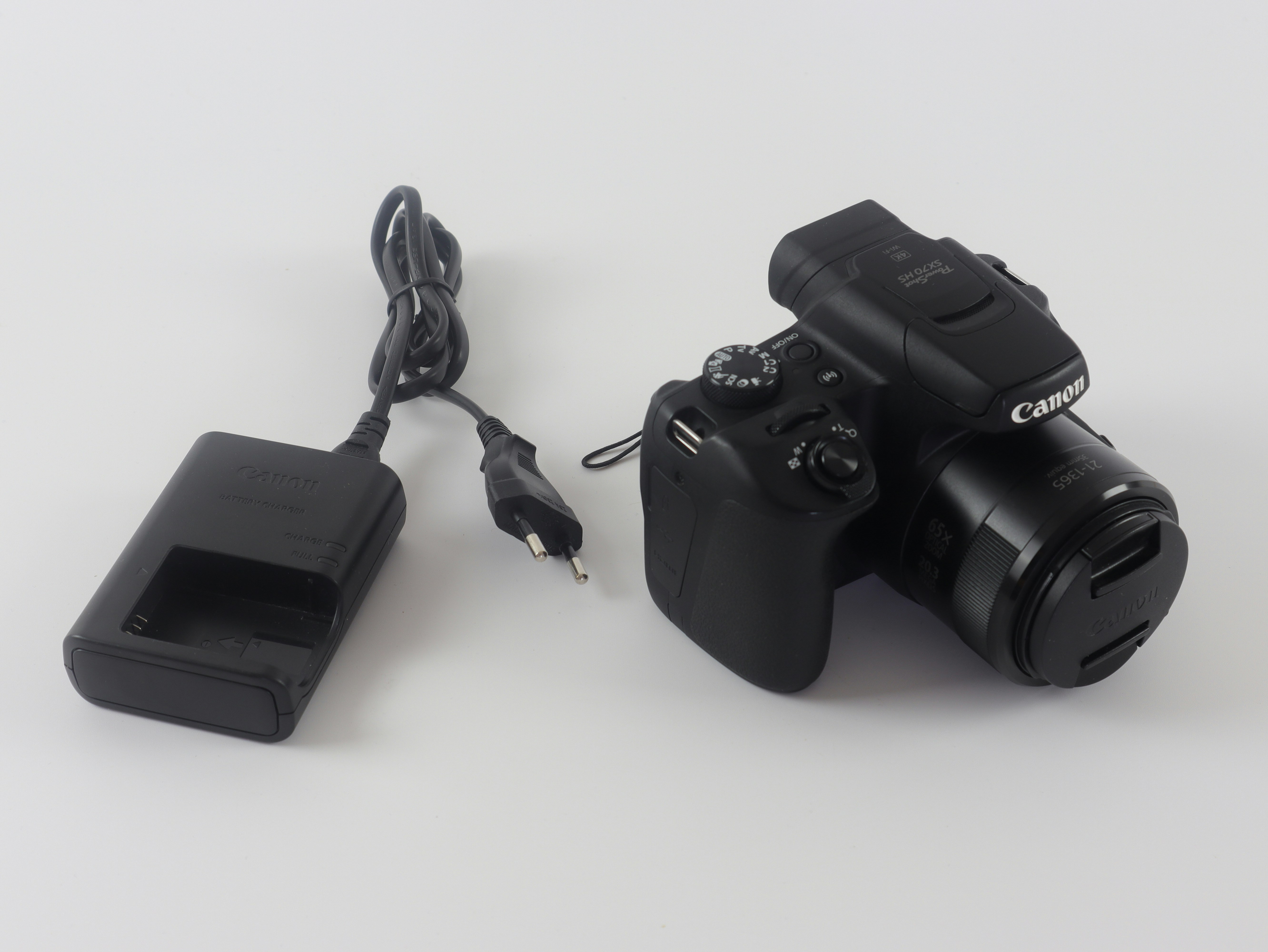 a camera with a charger attached to it