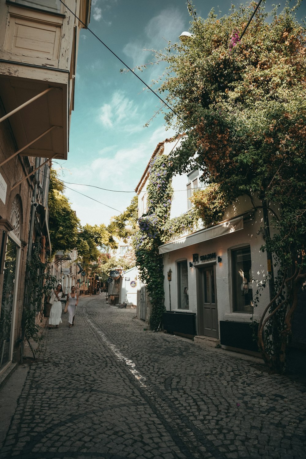 a cobblestone street in a small town