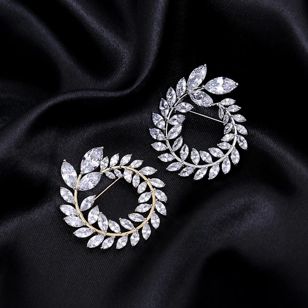 Silver laurel wreath earrings with marquise stones