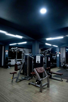 a gym with a lot of equipment in it