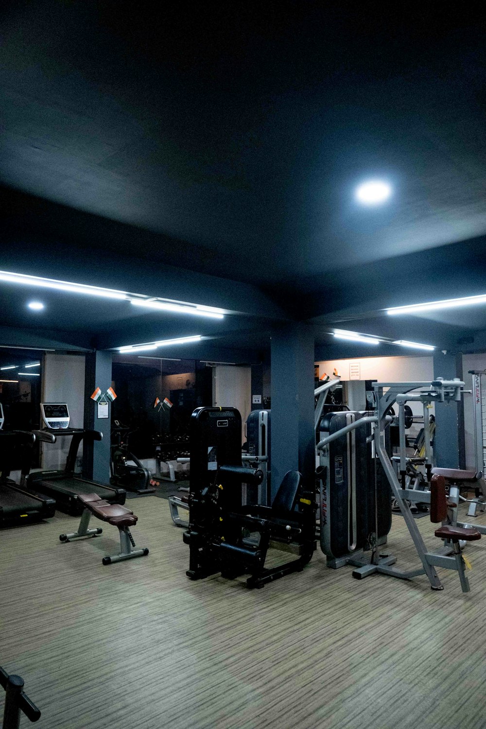 a gym with a lot of equipment in it