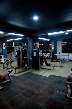 Interior view of Energym Sport Center gym with various exercise machines and workout spaces.