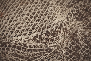 Detail of handwoven safety net with tight knots