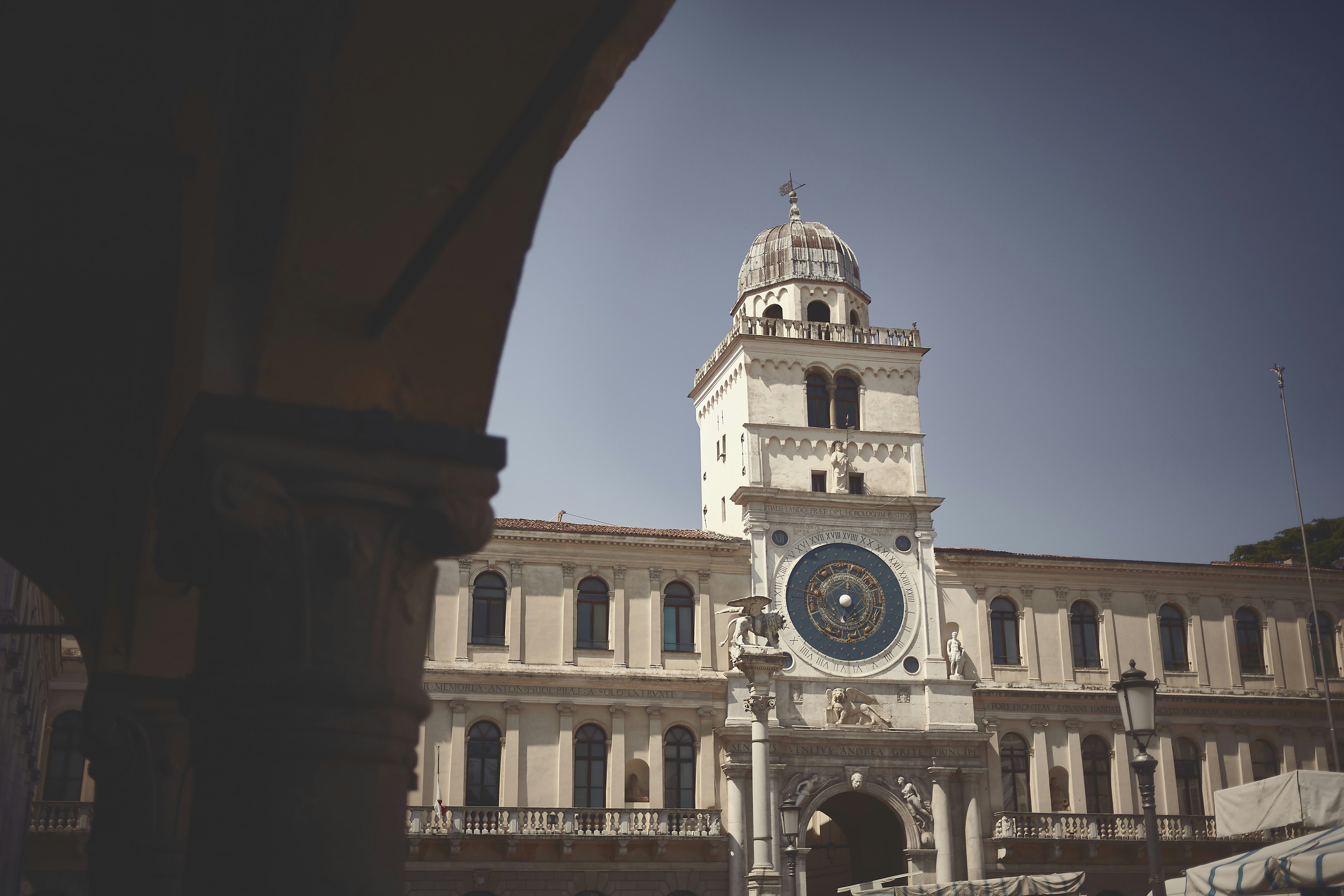 a large building with a clock on the front of it