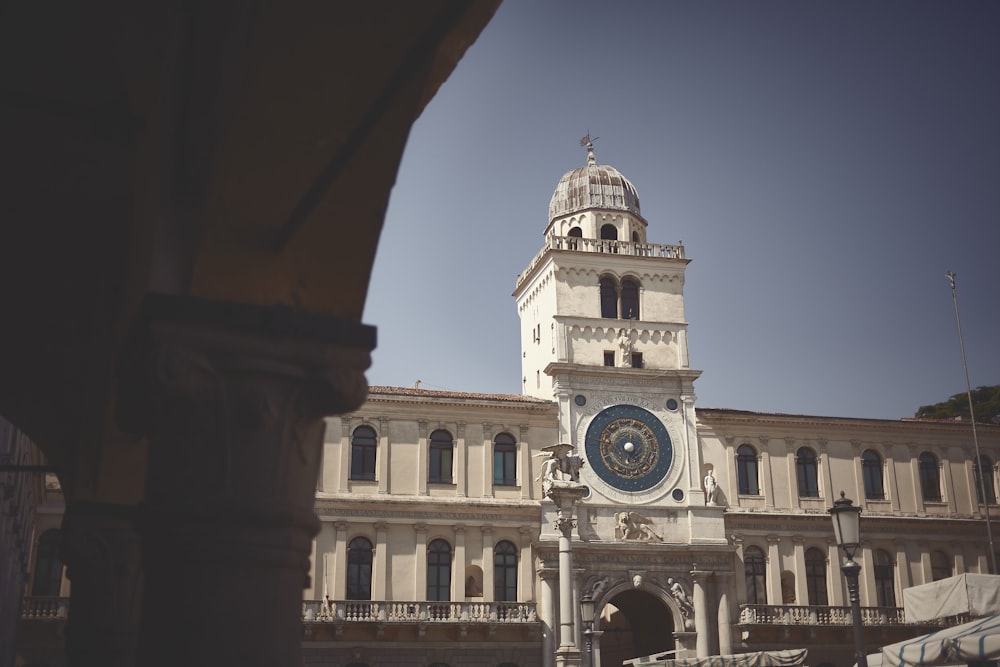 a large building with a clock on the front of it