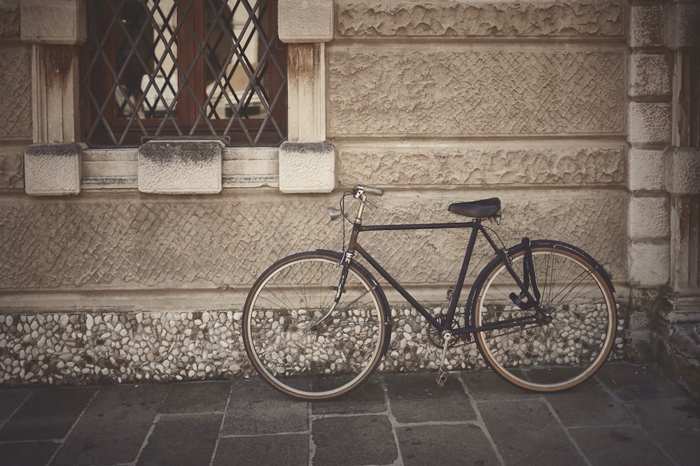 a bicycle parked in front of a building