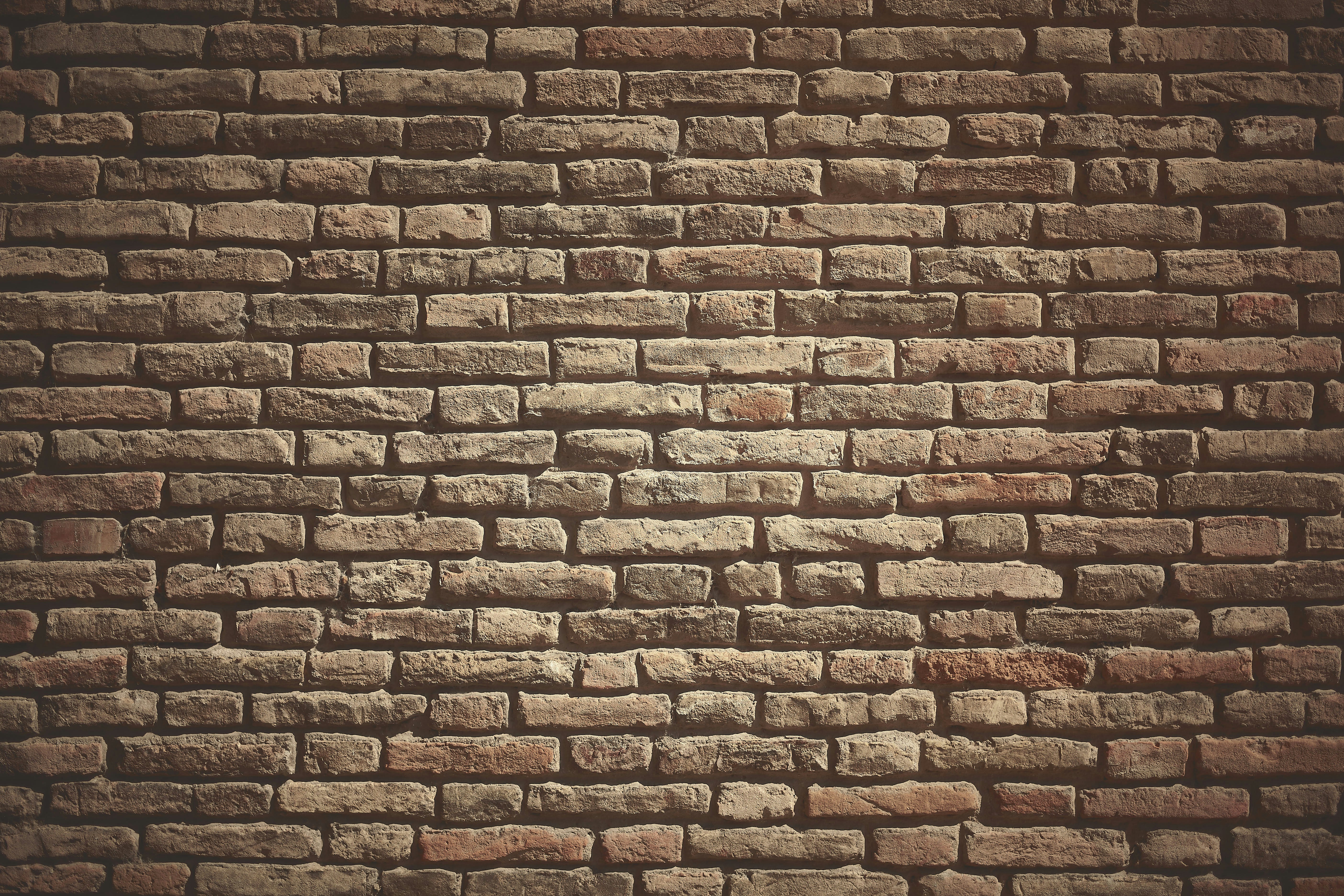 a brick wall made of small bricks