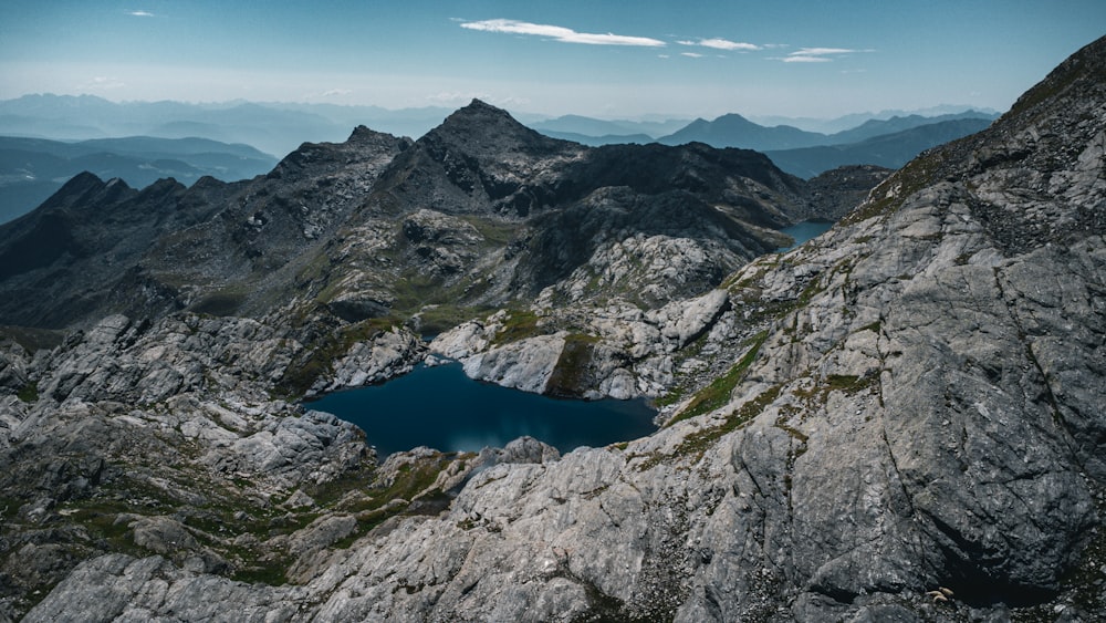 a mountain with a lake in the middle of it