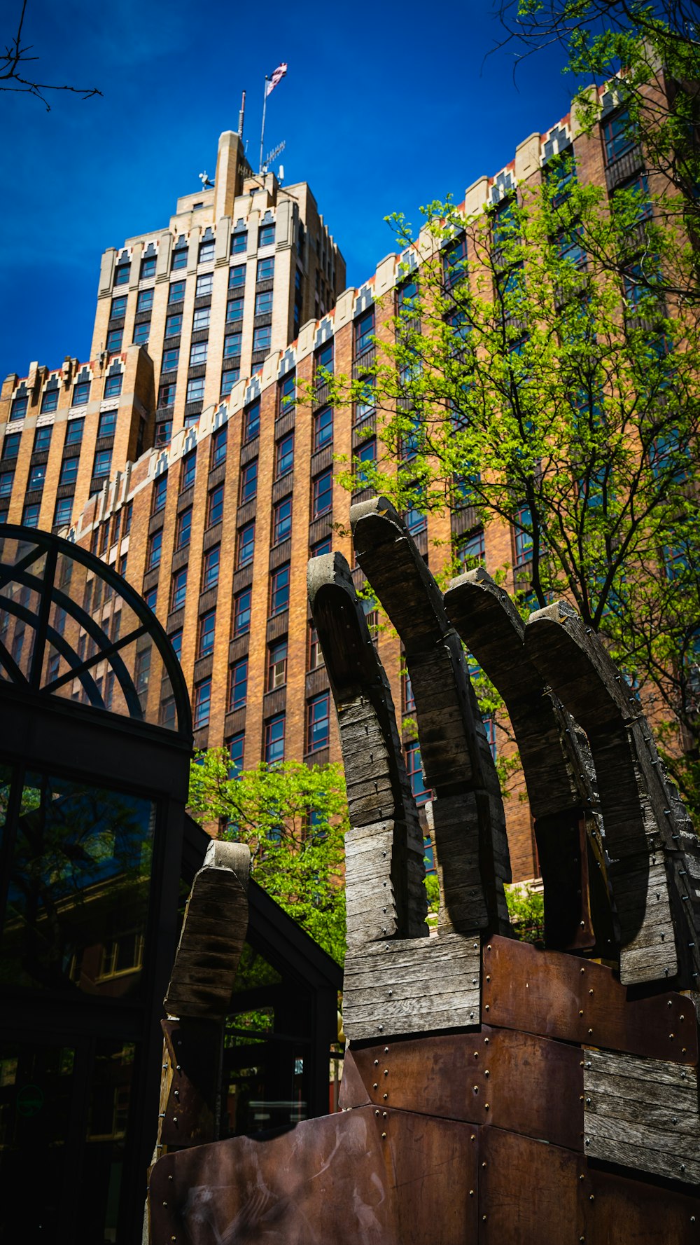 a tall building with a clock tower in the background