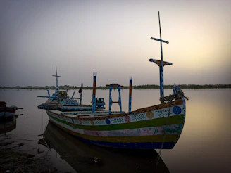 Luxury floating boat docked on calm blue waters with vintage wooden details and nautical decor.