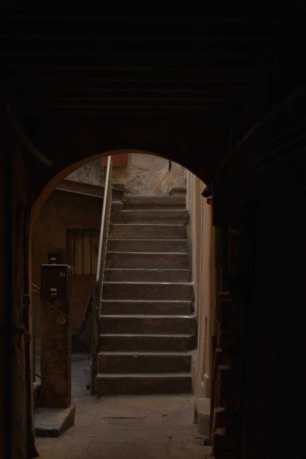 a set of stairs leading up to a phone booth