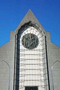 a large building with a clock on the front of it