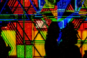 Abstract VJ mapping projection inspired by autumnal colors on a textured wall.