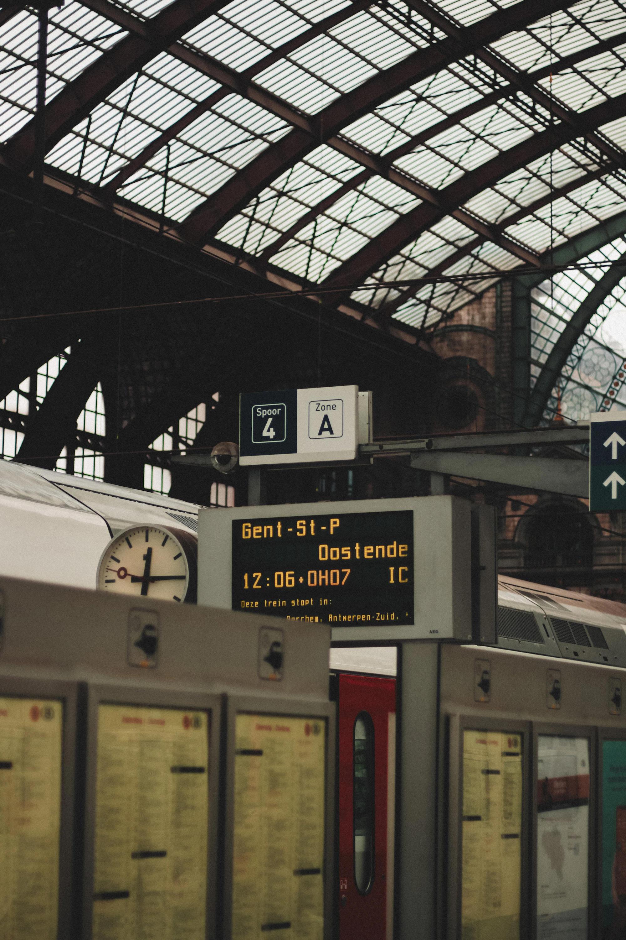 Antwerpen-Centraal railway station platform with departure clock