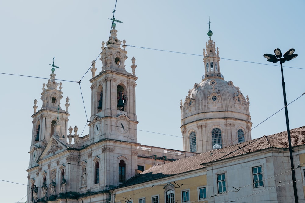 a large building with two towers and a clock