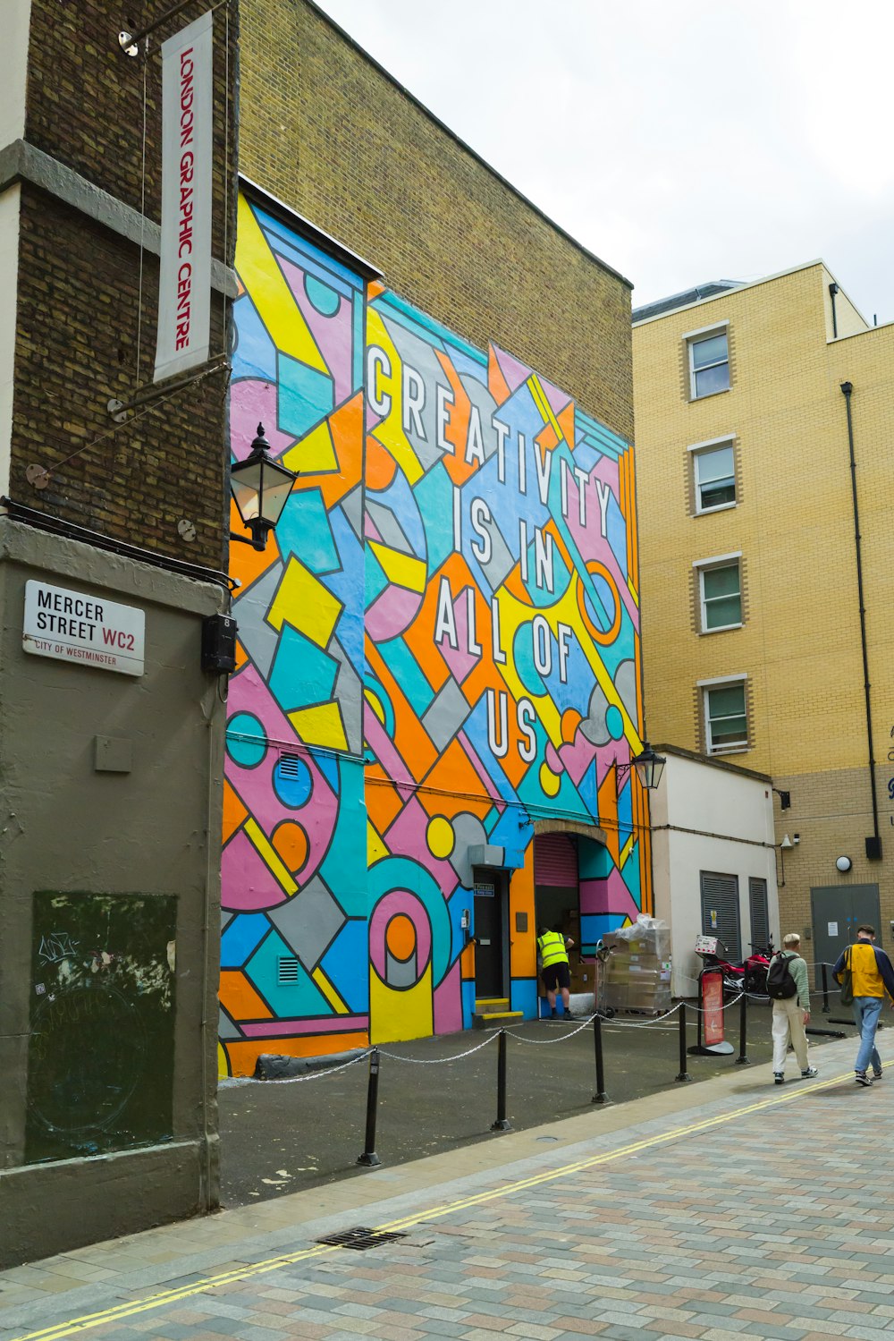a building with a colorful mural on the side of it