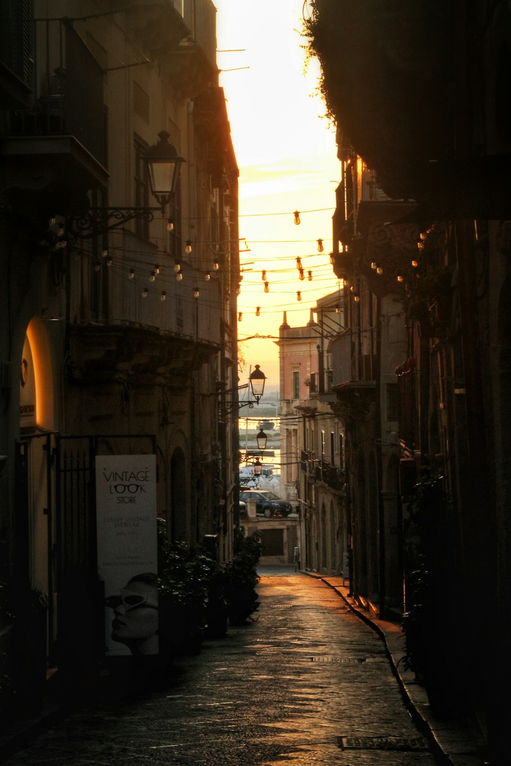 a city street with a bunch of buildings on both sides of it