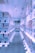A brightly lit aisle lined with numerous vending machines on both sides, displaying various colorful items inside them. The machines have a modern, clean design, and the floor is carpeted. The ceiling has several spotlights and decorations with vibrant patterns are hanging overhead.