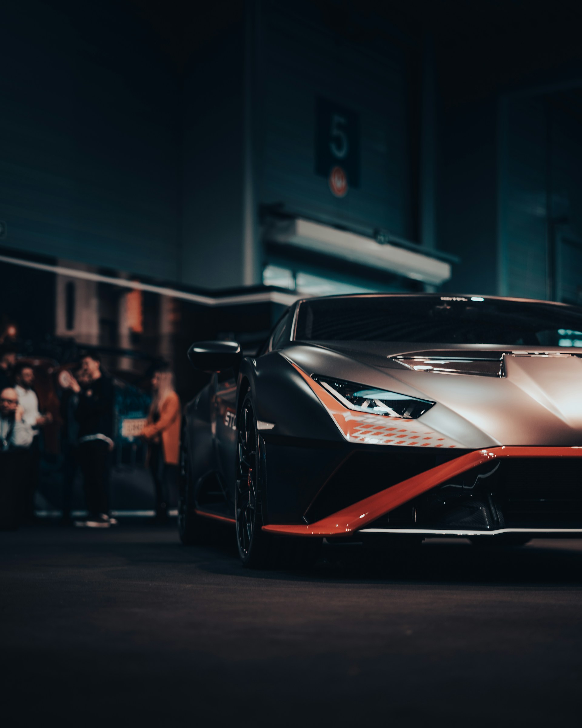 black and brown leather padded tub sofa