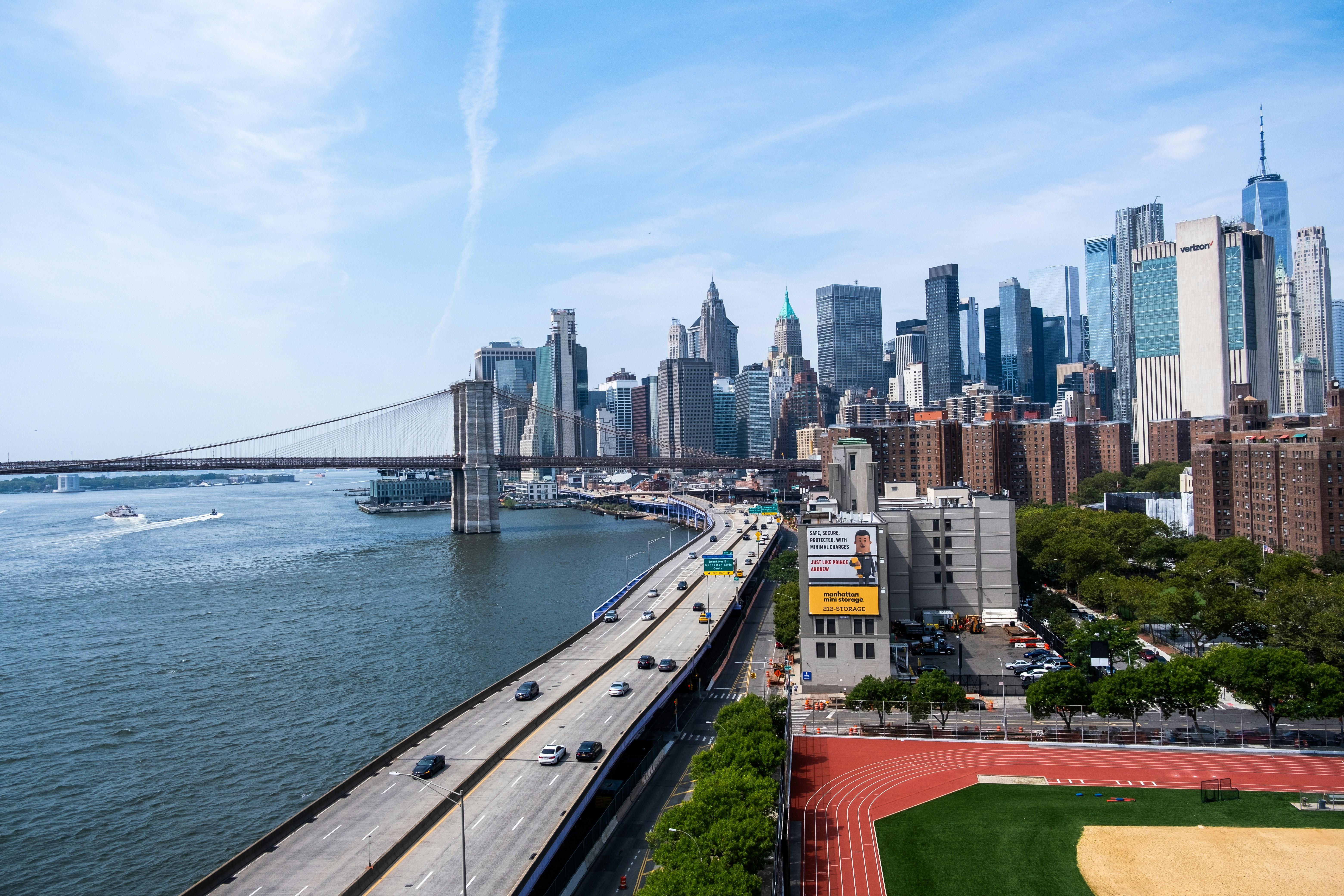 a view of a city and a bridge over a body of water