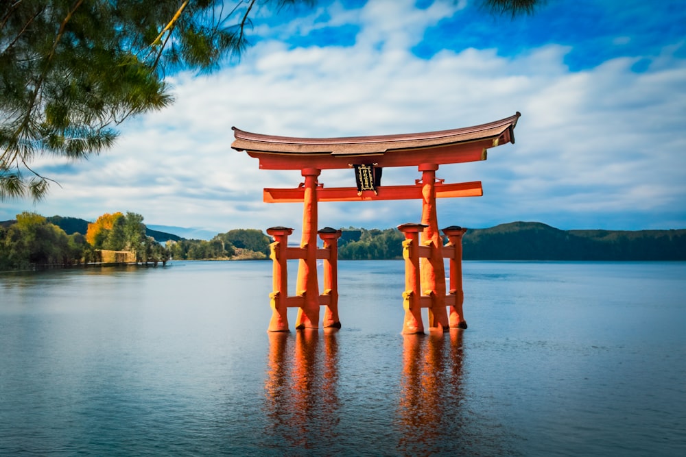 a large body of water with a large wooden structure in the middle of it