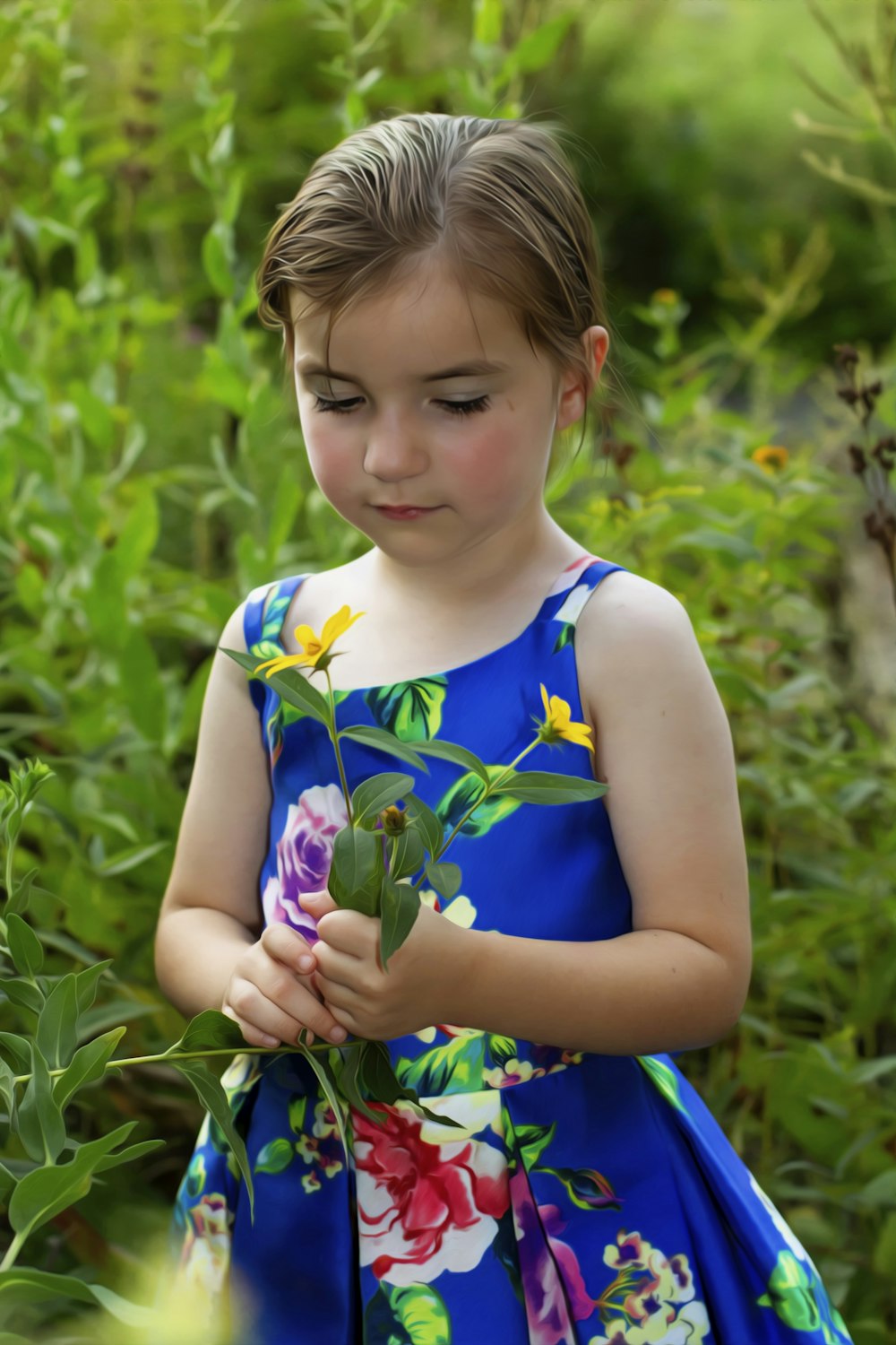 a little girl in a blue dress holding a flower