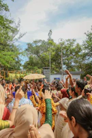 Fans dressed as Keluang Man gathered at a lively community event.