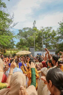 Fans dressed as Keluang Man gathered at a lively community event.