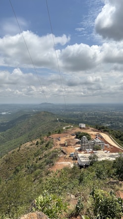 A scenic view of a construction site surrounded by nature.