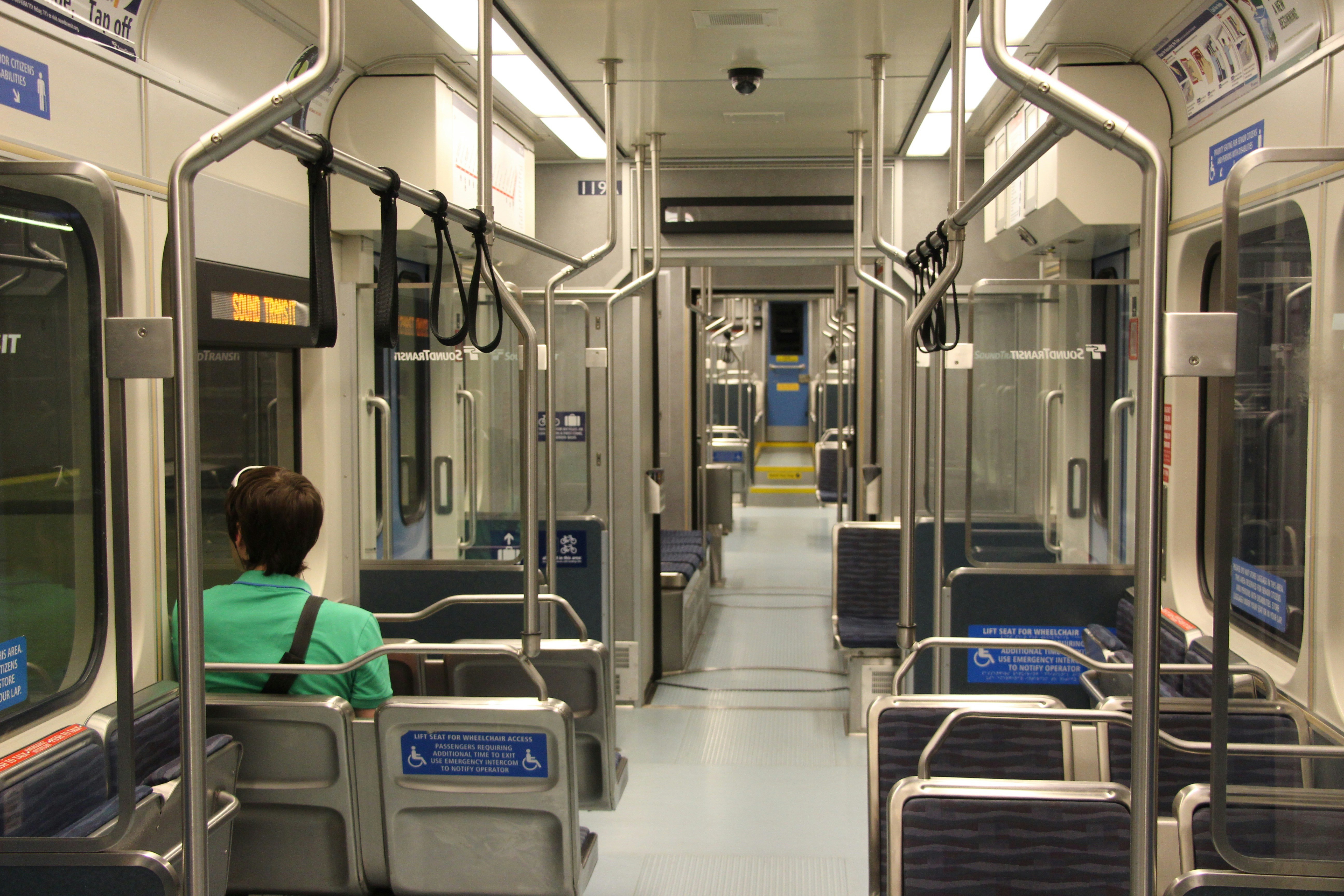 Passenger on a light rail train in the USA