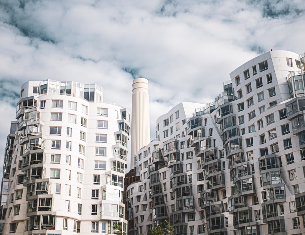 a group of tall buildings next to each other