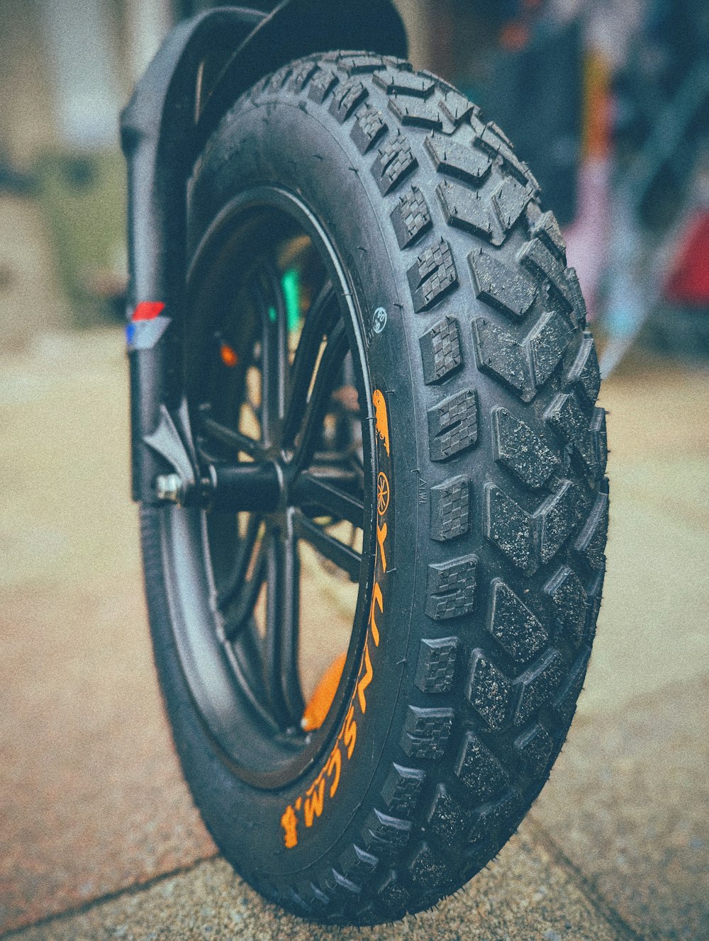 a close up of a tire on a motorcycle