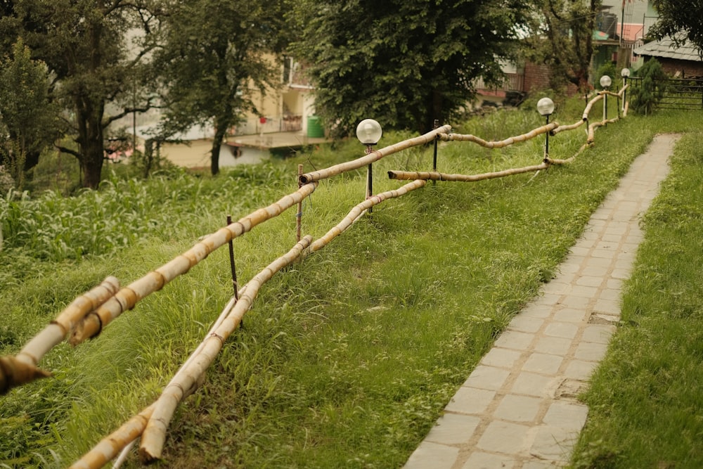 a wooden fence made out of bamboo sticks
