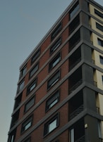 A finished mid-rise building showcasing modern architecture.