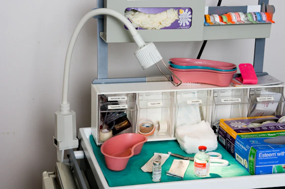 Close-up of a sleek hospital trolley with medical supplies neatly organized.
