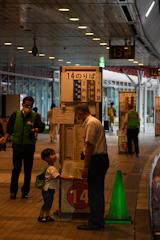 Parent happily talking to the bus driver during a drop-off.