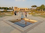 Grand central garden with lush greenery and open spaces.