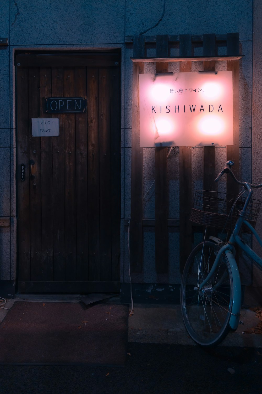a bicycle is parked outside of a building