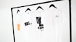 A stylish arrangement of plain tees in various colors, showcasing minimalist designs.