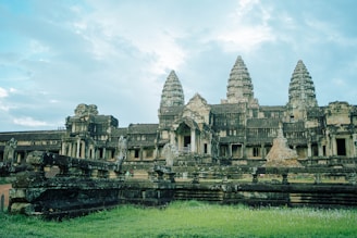 a large stone building with many towers on top of it