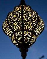 A beautifully carved wooden lamp showcasing intricate details.